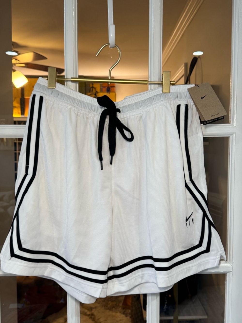 Nike Women’s White Athletic Shorts with Black Accents - Picture 2 of 4